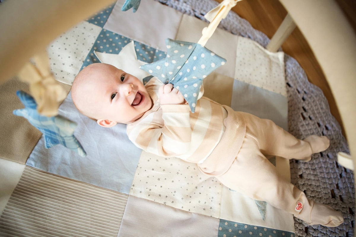 The Science & Sensorial Joy of Handmade Baby Activity Mats